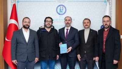 Akademisyenler Doç. Dr. Ferdi Güzel, Doç. Dr. Kürşad Kara ve