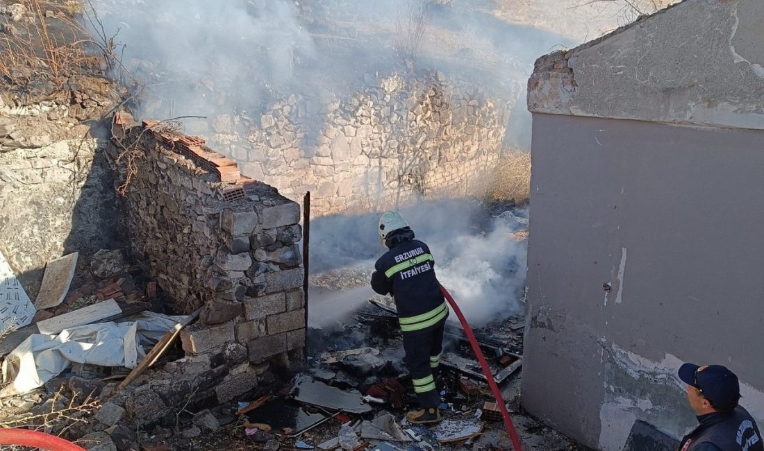 Erzurum’da bir binanın yanındaki kömürlük ve otluk alanda çıkan yangın,